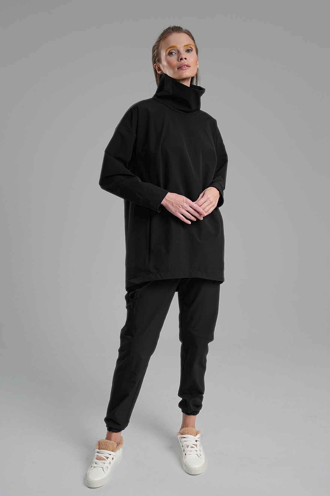 Black Bi-Stretch Wrap Top with Concealed Pocket