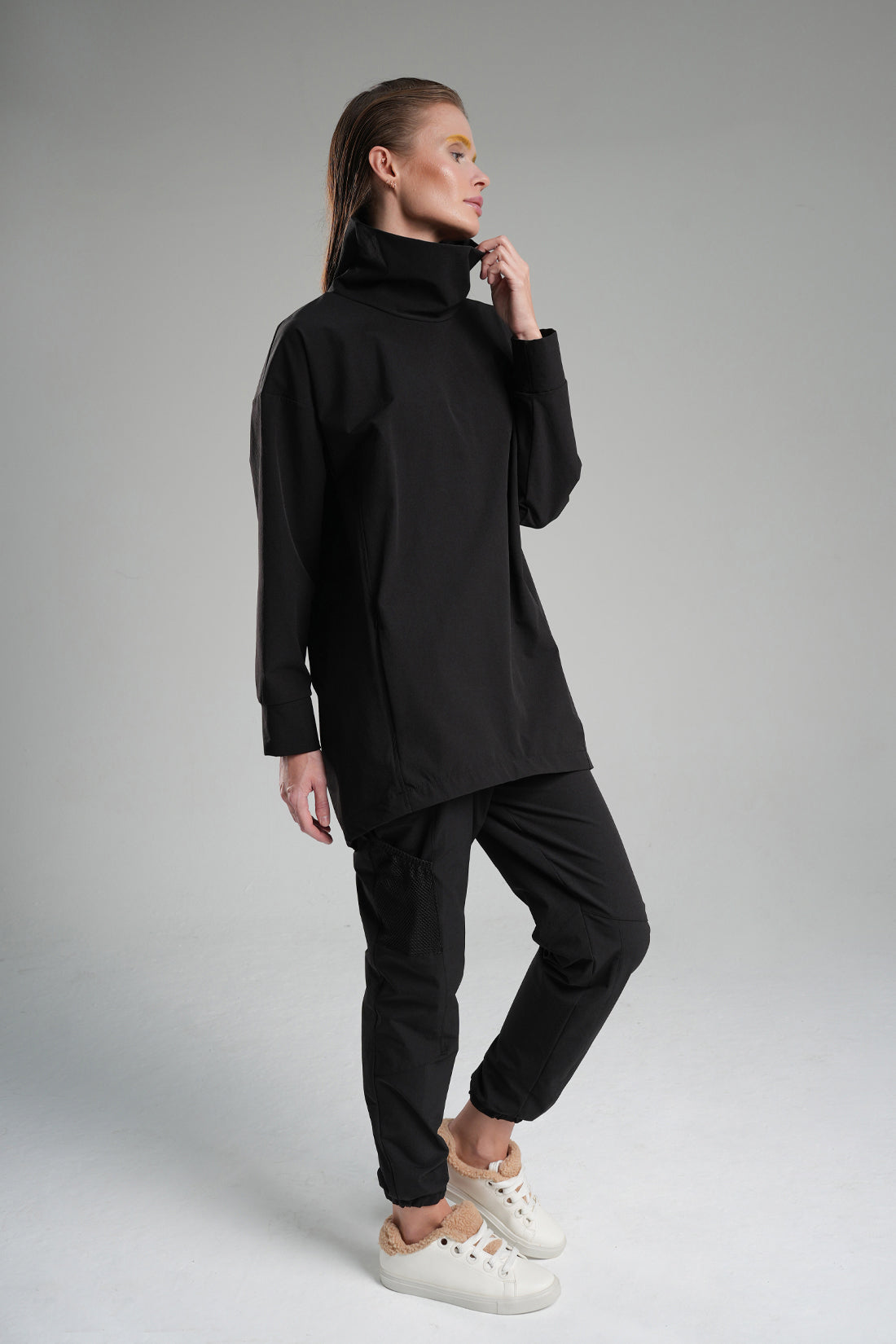 Black Bi-Stretch Wrap Top with Concealed Pocket